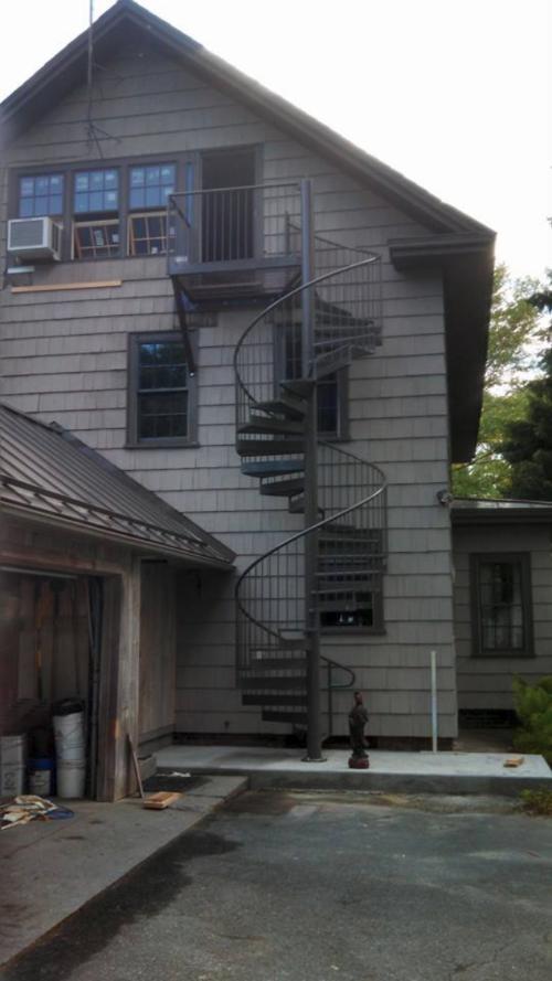 3 story spiral stair and landing